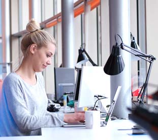 A woman working in a Serviced Office